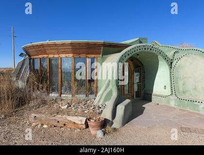 Earthship Biotecture home at 2 Earthship Way in Tres Piedras, New Mexico on November 14, 2019 Stock Photo