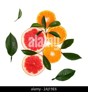 Citrus fruits isolated on white background. Isolated citrus fruits. Pieces of mandarin, pink grapefruit and orange isolated on white background, with Stock Photo