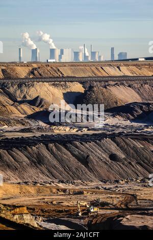 Juechen, North Rhine-Westphalia, Germany - RWE opencast lignite mine Garzweiler, Rhenish lignite mining area. In the back the RWE power plants Frimmer Stock Photo