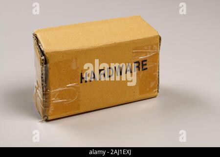 A very basic cardboard box labelled hardware Stock Photo