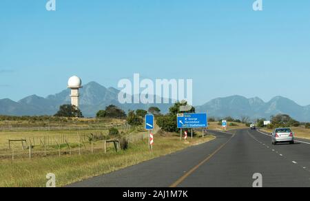 George, Western Cape, South Africa. December 2019. Airport control tower and road sign from the N2 highway Stock Photo