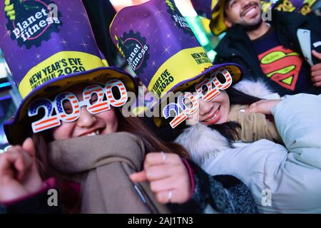 New Years Eve revelers are seen during the Times Square New Year's Eve 2020 Celebration on December 31, 2019 in New York City.