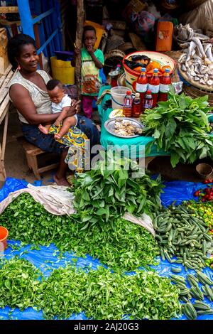 Woman selling vegetables at Kpalime market, Togo, West Africa, Africa Stock Photo