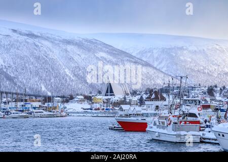 Tromso, small boat harbour, fjord, bridge, Arctic Cathedral, after heavy snow in winter, Troms, Arctic Circle, North Norway, Scandinavia, Europe Stock Photo