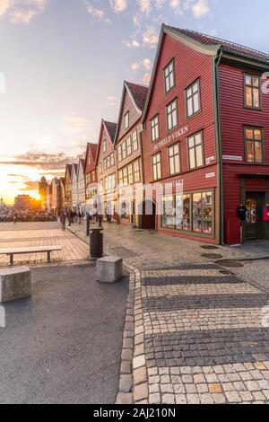 Sunset over cobblestone street and old buildings in Bryggen, UNESCO, Bergen, Hordaland County, Norway, Scandinavia, Europe Stock Photo
