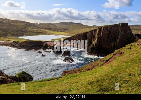 North Ham Bay, deep inlet, elevated view, red granite cliffs, stacks, Town Loch, Muckle Roe Island, Shetland Isles, Scotland, United Kingdom, Europe Stock Photo