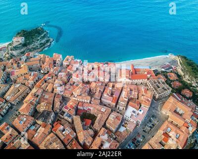 Aerial view of Tropea, house on the rock and Sanctuary of Santa Maria dell'Isola, Calabria. Italy. Rooftops of Tropea