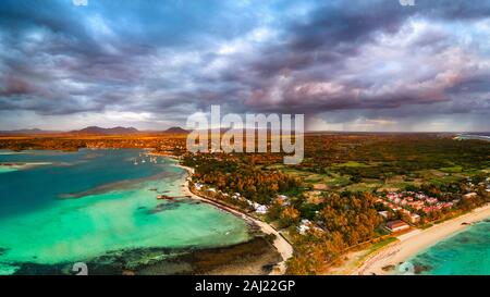 Dramatic sky at dawn over Trou d'Eau Douce coastline, aerial view, Flacq district, East coast, Mauritius, Indian Ocean, Africa Stock Photo