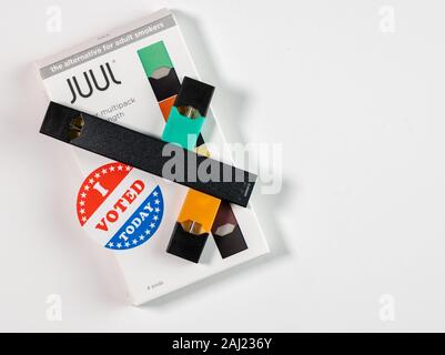 mexican mango ice geek bar Morgantown, WV - 2 January 2020: Juul mango nectar flavored nicotine vaping  system banned in the USA Stock Photo