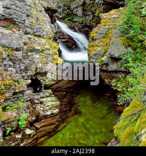 waterfall dropping into a gorge on the upper jocko river near arlee, montana Stock Photo