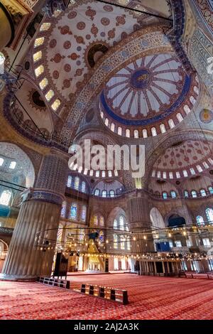 istanbul, turkey - AUG 18, 2015: inside interior of blue mosque also known as sultan ahmed. functioning mosque is a popular travel destination Stock Photo