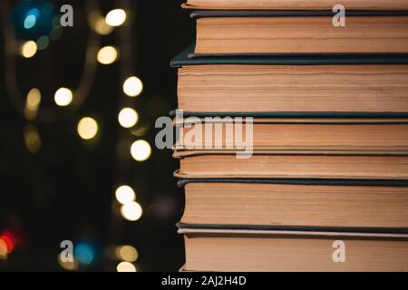 The book on bokeh background. Christmas atmosphere Stock Photo