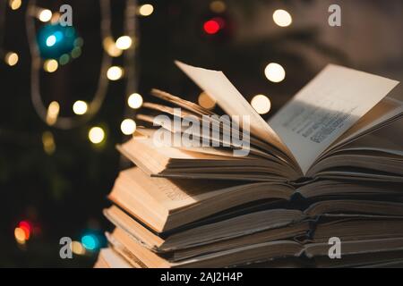 The book on bokeh background. Christmas atmosphere Stock Photo