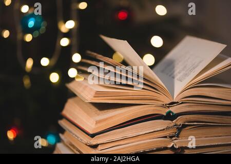 The book on bokeh background. Christmas atmosphere Stock Photo