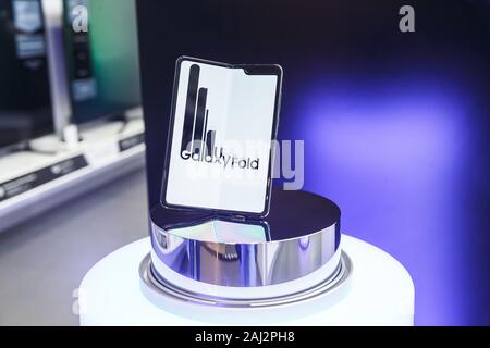 Minsk, Belarus - December 25, 2019: Viewing the new Samsung Galaxy Fold 5G. Stock Photo