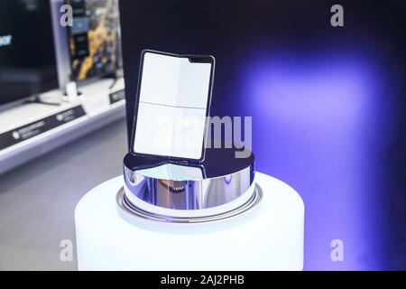 Minsk, Belarus - December 25, 2019: Viewing the new Samsung Galaxy Fold 5G. Stock Photo