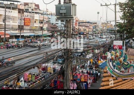 power lines at the mainroad at the Thai Border in the town of Mae Sai on the Border to Myanmar in the Chiang Rai Province in North Thailand.   Thailan Stock Photo