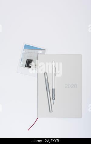 2020 Diary on a white background with various props. 30.12.2019 Please credit: Phillip Roberts Stock Photo