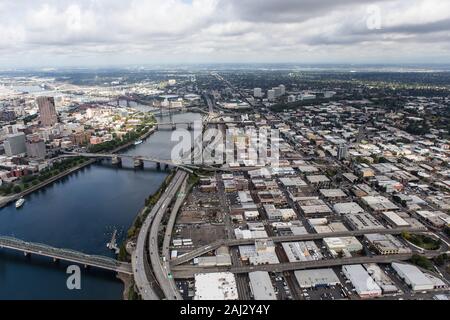 Aerial view of industrial streets, buildings and the Williamette River in East Portland, Oregon, USA. Stock Photo