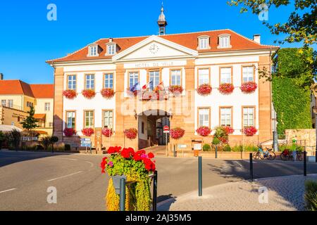 RIQUEWIHR, FRANCE - SEP 19, 2019: Beautiful historic palace in old part of Riquewihr village which is located on famous wine route in Alsace region of