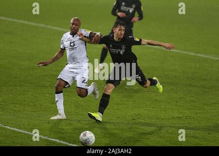 Swansea, UK. 02nd Jan, 2020. Andre Ayew of Swansea city (l) and Tom Lockyer of Charlton Athletic in action. EFL Skybet championship match, Swansea city v Charlton Athletic at the Liberty Stadium in Swansea, South Wales on Thursday 2nd January 2020. this image may only be used for Editorial purposes. Editorial use only, license required for commercial use. No use in betting, games or a single club/league/player publications. pic by Andrew Orchard/Andrew Orchard sports photography/Alamy Live news  Stock Photo