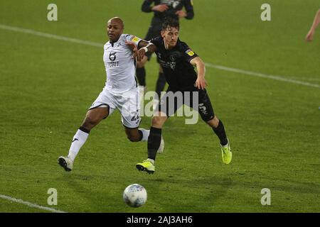 Swansea, UK. 02nd Jan, 2020. Andre Ayew of Swansea city (l) and Tom Lockyer of Charlton Athletic in action. EFL Skybet championship match, Swansea city v Charlton Athletic at the Liberty Stadium in Swansea, South Wales on Thursday 2nd January 2020. this image may only be used for Editorial purposes. Editorial use only, license required for commercial use. No use in betting, games or a single club/league/player publications. pic by Andrew Orchard/Andrew Orchard sports photography/Alamy Live news  Stock Photo