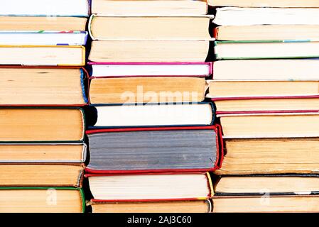 Stack of books background. many books piles Stock Photo