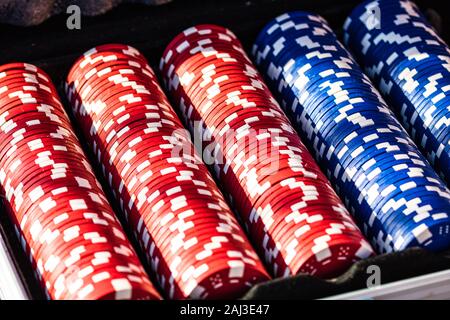 Poker chips close up background. Casino concept, risk, chance, good luck or gambling. Detail of casino chips in the box Stock Photo