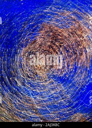Twisted, colorful light streaks. Abstract chaotic background. Stock Photo