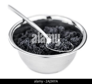 Portion of Black Caviar isolated on white background (selective focus) Stock Photo