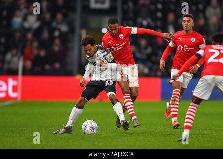 DERBY, ENGLAND - JANUARY 2ND Duane Holmes (23) of Derby County holds off Elliot Simoes (28) of Barnsley during the Sky Bet Championship match between Derby County and Barnsley at the Pride Park, Derby on Thursday 2nd January 2020. (Credit: Jon Hobley | MI News) Photograph may only be used for newspaper and/or magazine editorial purposes, license required for commercial use Credit: MI News & Sport /Alamy Live News Stock Photo