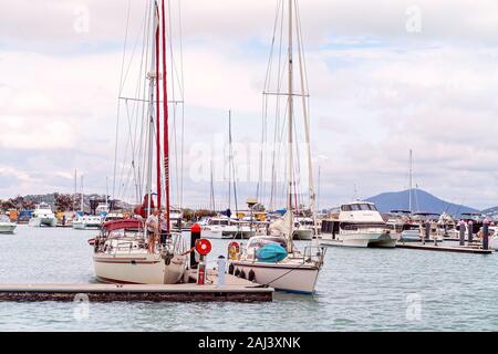 Yeppoon, Queensland, Australia - December 2019: Pleasure boats anchored at moorings at the marina Stock Photo