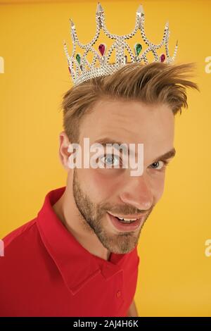 Funky prince. Glory seeking man. Man representing power and triumph. Business king. Cheerful guy wear crown. King of style. Achieving victory and succ Stock Photo