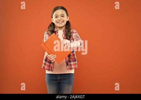 Did you know. Pupil with work book. Literature and writing lesson. Schoolgirl with notebook doing homework. Learning language. Studying is exciting. G Stock Photo