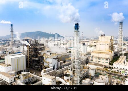 Aerial view of industrial area with chemical plant. Smoking chimney from factory Stock Photo