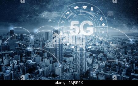 Futuristic city with 5G internet and application icons, Smart city Stock Photo