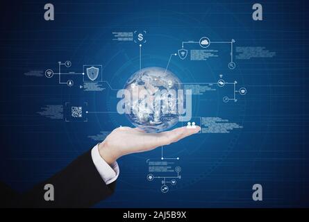 Hand holding globe with online data technology. Global business and big data concept. Element of this image are furnished by NASA Stock Photo