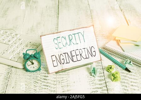 Word writing text Security Engineering. Business photo showcasing focus on the security aspects in the design of systems Notepaper stand on buffer wir Stock Photo
