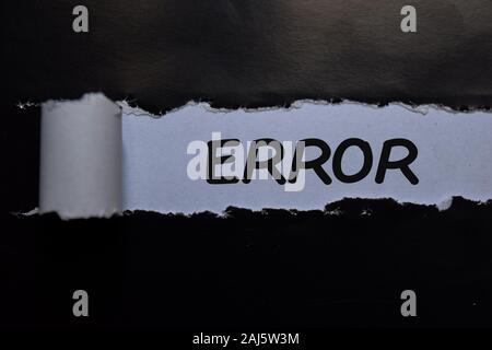 Error write on black and white torn paper Stock Photo