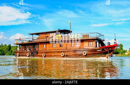 Mekong Delta, Vietnam; May 26 2014. Luxury cruiser in the Mekong Delta. Stock Photo