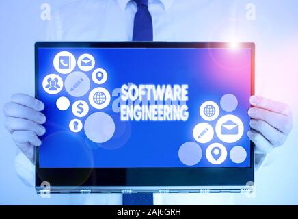 Writing note showing Software Engineering. Business concept for apply engineering to the development of software Stock Photo