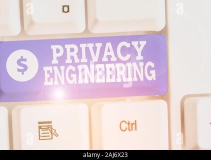 Writing note showing Privacy Engineering. Business concept for engineered systems provide acceptable levels of privacy Stock Photo