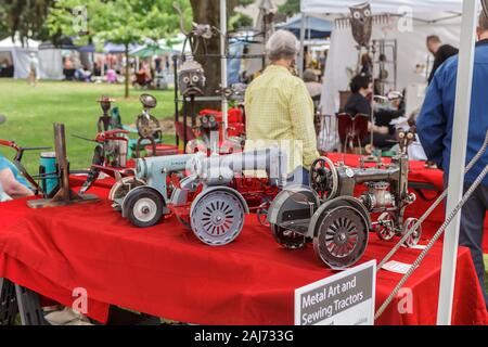 Vancouver, WA, USA - June 23, 2018: Artworks made from upcycled old Singer Sewing Machines on Recycled Arts Festival in Vancouver, Washington State Stock Photo