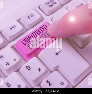 Text sign showing Unmotivated Employee. Business photo text very low self esteem and no interest to work hard Stock Photo