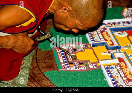 Making a sandmandala takes about 8-10 days concentrated work Stock Photo