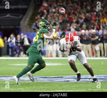 Baylor running back Trestan Ebner (1) leaps over TCU placekicker