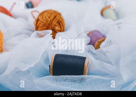 multi-colored threads for sewing and knitting Stock Photo