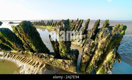 Remains of the wreckage of SS Nornen, Berrow Beach, Somerset, England, which can be seen at low tide. Stock Photo