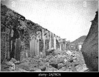Scientific American Volume 87 Number 23 (December 1902) . St. Nicholas Street, Where Several Women Were Killed. Ruins of the Arena, Where the Bull-Fights Were Held. Stock Photo