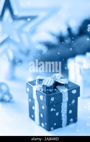 Classic blue 2020. Gradient color palette. Christmas background. Christmas Spruce, Decor and Present. Stock Photo